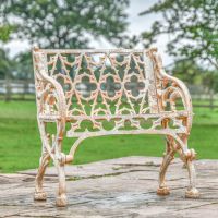 Aged Cream "Quatrefoil" Victorian Cast Iron One Seat Bench in Situ in the Garden