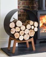 Black Round Steel "Barrel" Log Holder with Wooden Legs Digital illustration