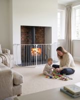 "BabyPro" White Five Panel Child Safety Fire Guard Digital Illustration Scale Shot With A Family "BabyPro" White Five Panel Child Safety Fire Guard Digital Illustration Scale Shot With A Family
