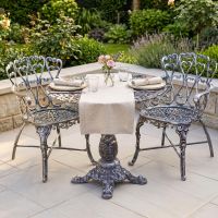The "Royal Ascott" 2-Seater Outdoor Bistro Set - Antique Silver Digital Illustration With A Dressed Table