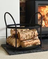 The Black Contemporary Open Log Rack in Front of a Lit Log Burner in a Modern Home - Digital Illustration The Black Contemporary Open Log Rack in Front of a Lit Log Burner in a Modern Home - Digital Illustration