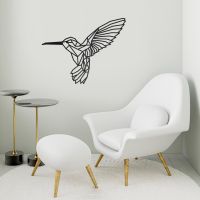 Geometric Steel Hummingbird Wall Art in Situ a Modern Sitting Room