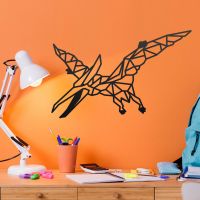 Geometric Iron Pterodactyl Wall Art on an Orange Wall