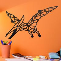 Geometric Iron Pterodactyl Wall Art on an Orange Wall Geometric Iron Pterodactyl Wall Art on an Orange Wall