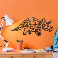 Geometric Iron Triceratops Wall Art on an Orange Wall