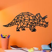 Geometric Iron Triceratops Wall Art on an Orange Wall Geometric Iron Triceratops Wall Art on an Orange Wall