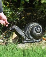 Giant snail black and gold sculpture