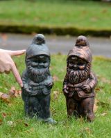 ‘Podge’ the Small Garden Gnome in Cast Aluminium - Verdigris stood with copper version and hand in shot to reference scale