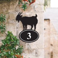 Bespoke Goat Iron House Number Sign on a Garden Wall