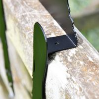 Close-up of the Goat Leaning Fence Topper Leaning on the Fence Close-up of the Goat Leaning Fence Topper Leaning on the Fence