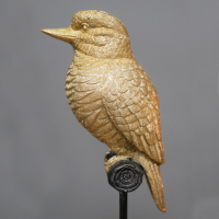 View From the Side of the Gold Bird on Stand