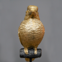 Front View of the Gold Bird on Stand