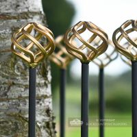 Gold Decorative Finials On Tree Guard