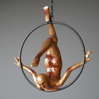 Front View of the Gold Painted Hanging Acrobat Woman Ornament Front View of the Gold Painted Hanging Acrobat Woman Ornament