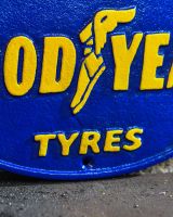 Close up of "Goodyear Tyres" Cast Automobilia Reproduction Sign finish