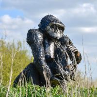 Gorilla with Baby Sculpture in Situ in the Garden