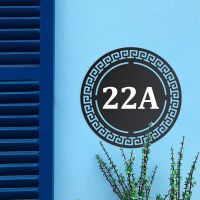 Circular Greek House Number Sign in Situ