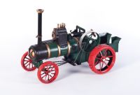 Period green steam engine tractor model