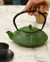 Cast Iron Green Teapot With Dragonfly Design In Use 