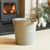 Grey Ash Bucket with Lid In A Fireplace Setting Grey Ash Bucket with Lid In A Fireplace Setting