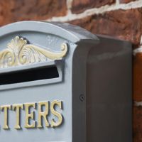 Close-Up of Detail onGrey & Gold Curved Cambridge Traditional Wall Mounted Post Box Close-Up of Detail onGrey & Gold Curved Cambridge Traditional Wall Mounted Post Box