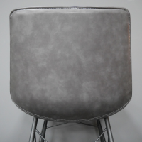 Close-up of the Back of the Grey Leather Dining Chair