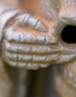 Close-up of Cast iron Grim Reaper Sculpture Close-up of Cast iron Grim Reaper Sculpture