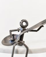 Close up of intricate detail in scrap metal interior ornament Close up of intricate detail in scrap metal interior ornament