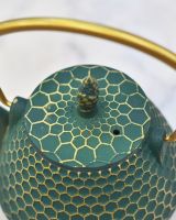 Close up of "Hachi" Green and Gold Cast Iron Japanese Style Teapot lid