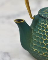 Close up of "Hachi" Green and Gold Cast Iron Japanese Style Teapot spout