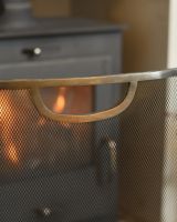 Close Up Of The handle On The Kirby Curved Fire Screen