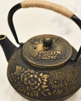 Handle Up on Cast Iron Teapot  Handle Up on Cast Iron Teapot