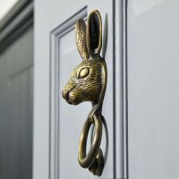 Side profile of Antique Brass Rabbit Door Knocker 