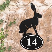 Hare Iron House Number Sign in Situ on a Rustic Wall 