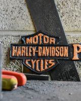Close up of Harley Davidson Parking Vintage Style Cast Iron Sign finish Close up of Harley Davidson Parking Vintage Style Cast Iron Sign finish