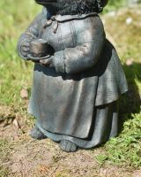 Close up of clothes detail on resin garden sculpture