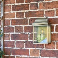 "Heathfield" Half Wall Lantern Finished in a Antique Brass Finish "Heathfield" Half Wall Lantern Finished in a Antique Brass Finish