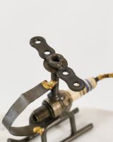 Close up of intricate top detail on recycled metal art sculpture