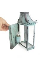 Scale image of verdigris wall light