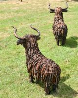 Back view of highland cow outdoor sculpture Back view of highland cow outdoor sculpture