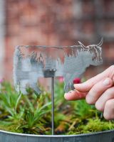Highland Cow Artistic Plant Pot Spike - Set of Two with hand in shot for scale Highland Cow Artistic Plant Pot Spike - Set of Two with hand in shot for scale