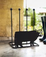 Highland Cow Double Welly Boot Rack on a porch