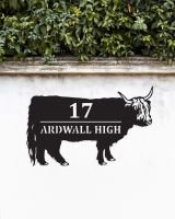 Highland Cow Steel House Sign on a White Garden Wall