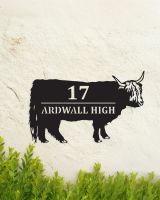 Highland Cow Steel House Sign in Situ on a Painted house Wall
