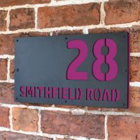 Purple "Smithfield" House Sign in Situ on the Wall Purple "Smithfield" House Sign in Situ on the Wall