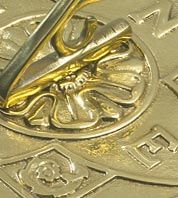 Close up of brass detail on sundial