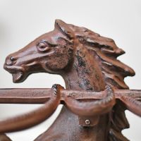Detailed image of horse head on umbrella stand