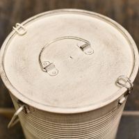 Log or coal holder with lid and clasps