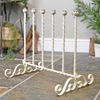 Wrought iron wellington boot rack finished in cream