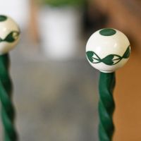 Detailed image of ceramic finials on boot rack